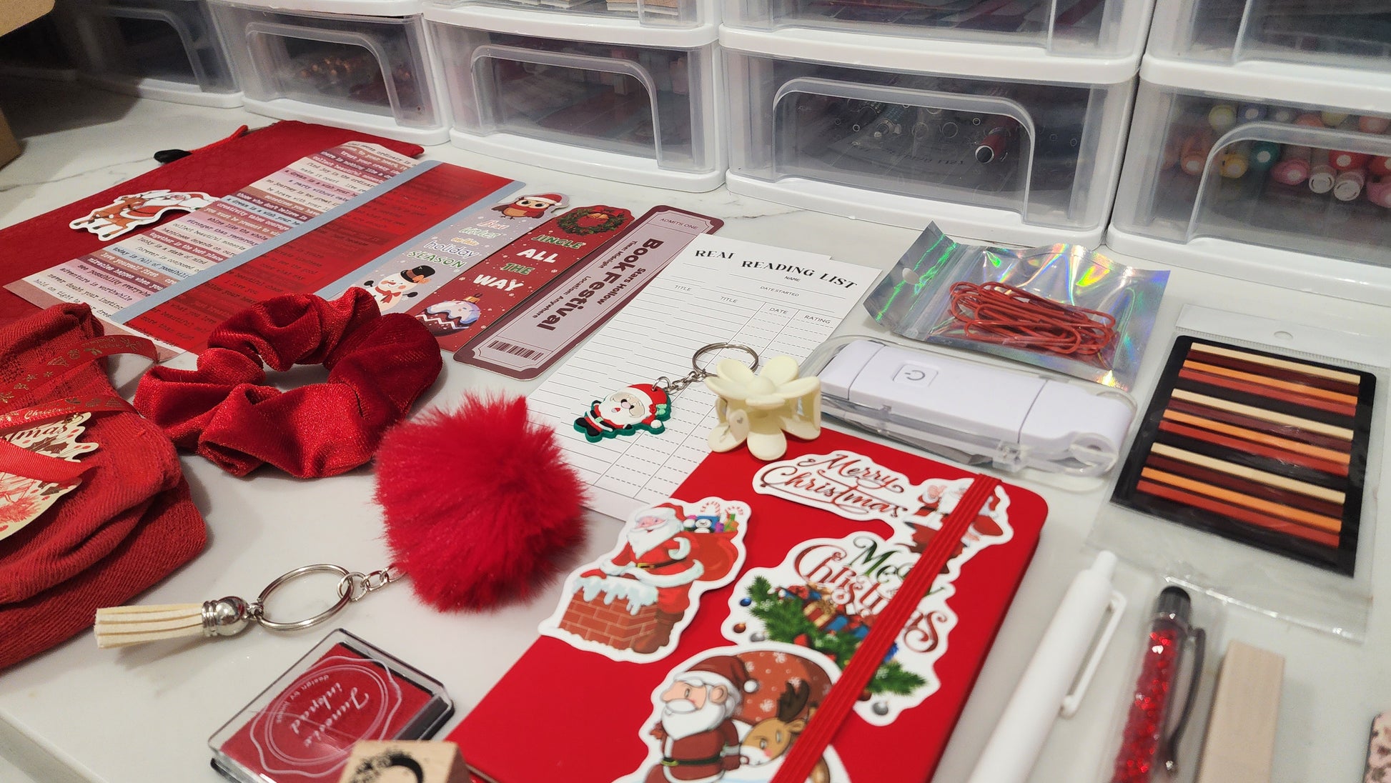 Collection of Christmas-themed stationery items on a desk
