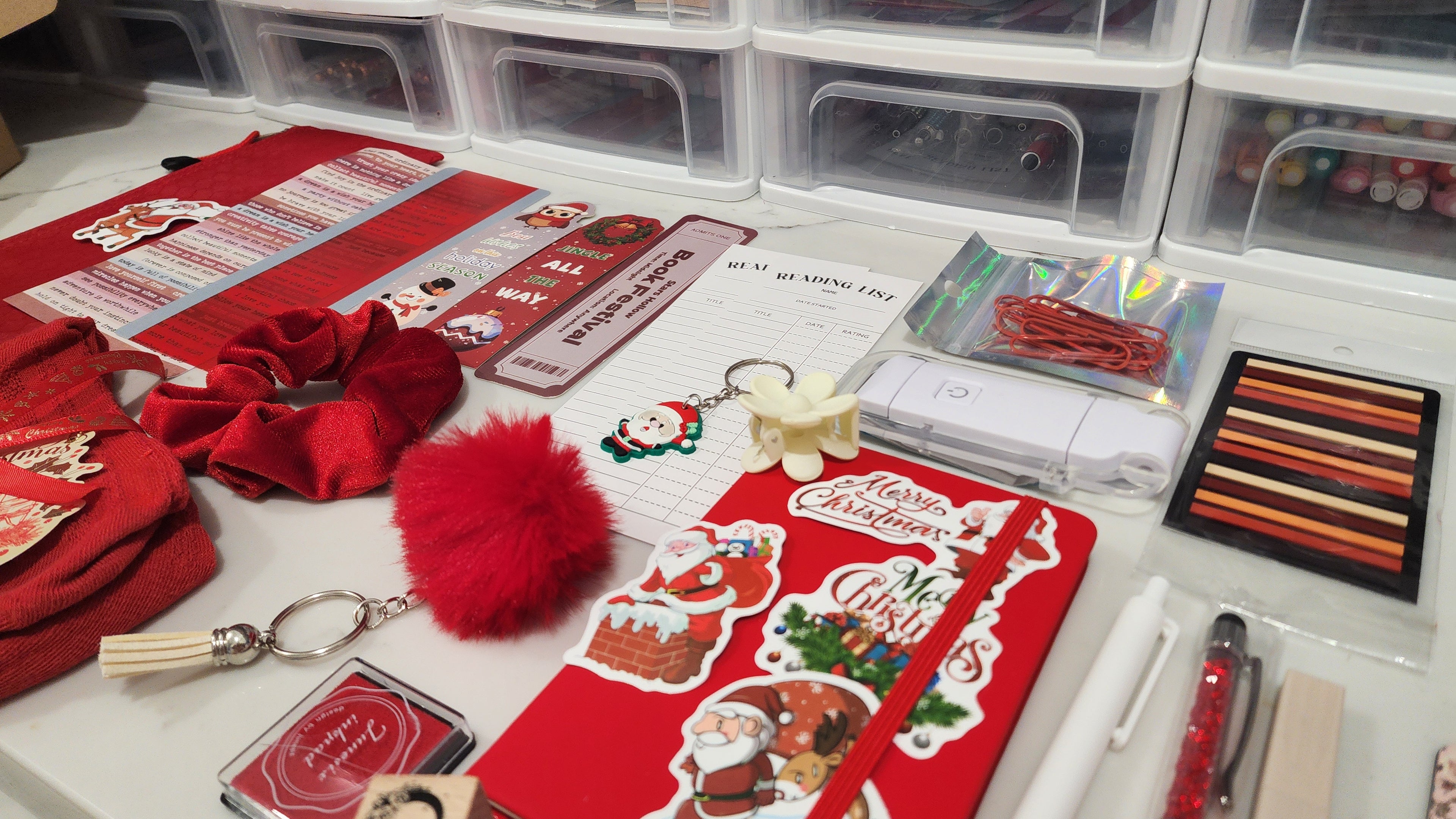 Collection of Christmas-themed stationery items on a desk