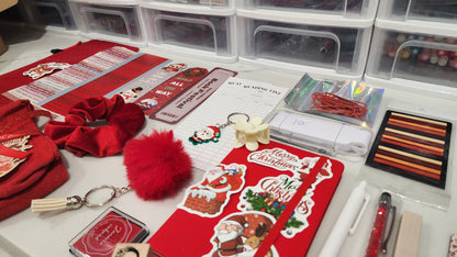Collection of Christmas-themed stationery items on a desk